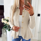 Dámský elegantní sako s volánky a peplum